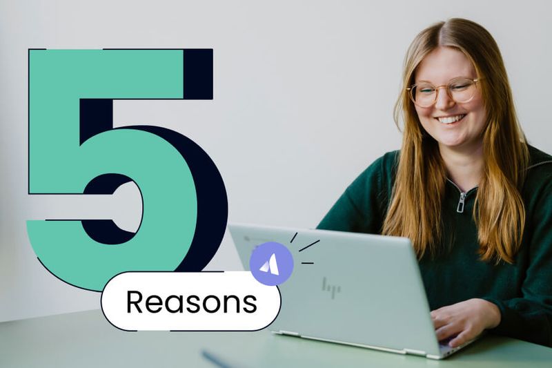 A young team member with a laptop thinks about reasons for Runs on Atlassian.