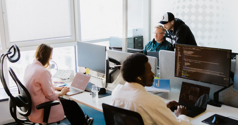 A development team works on new Forge apps.