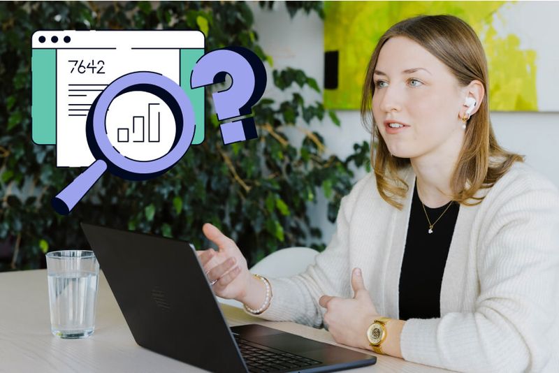 A team member at the laptop explains the differences between Connect and Forge